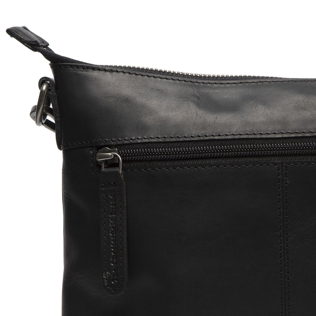
Solid Antique Brass Hardware & Heavy-Duty Dual Zipper Detail on Faro Кожаная сумка-кроссбоди